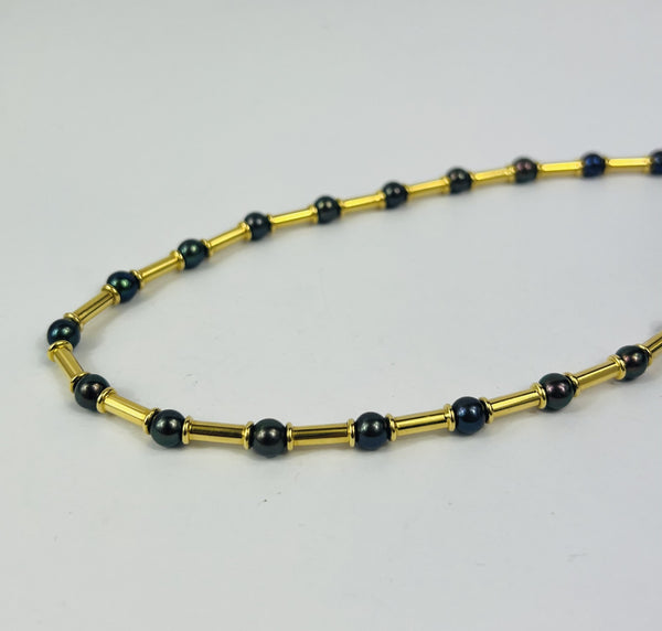 Collier or et perles Hématites