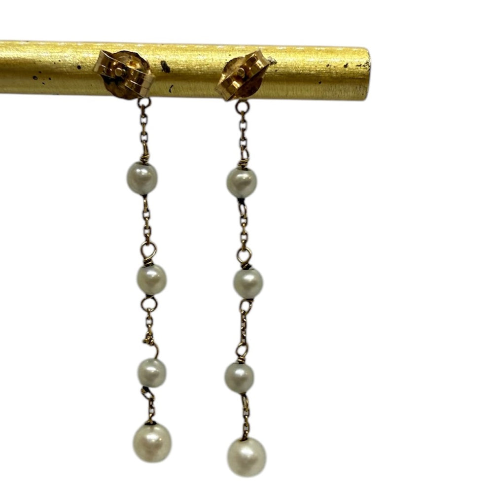 Boucles d'oreilles pendantes en or et perles