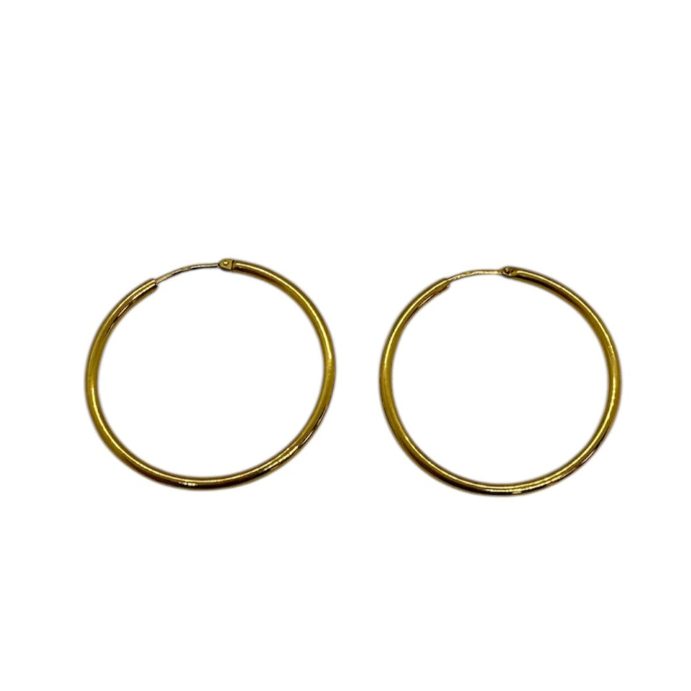 Boucles d'oreilles créoles en or jaune 18 carats