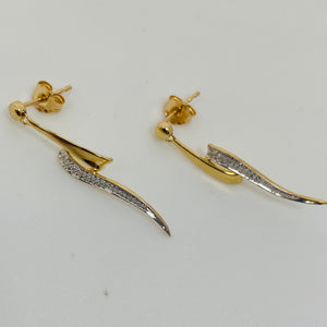 Boucles d'oreilles en or jaune 18 carats avec zirconiums