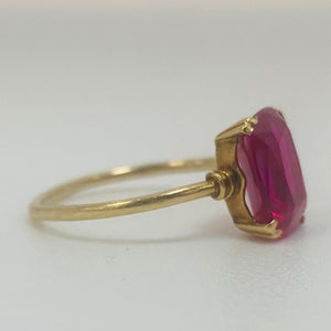 Bague or avec pierre rose