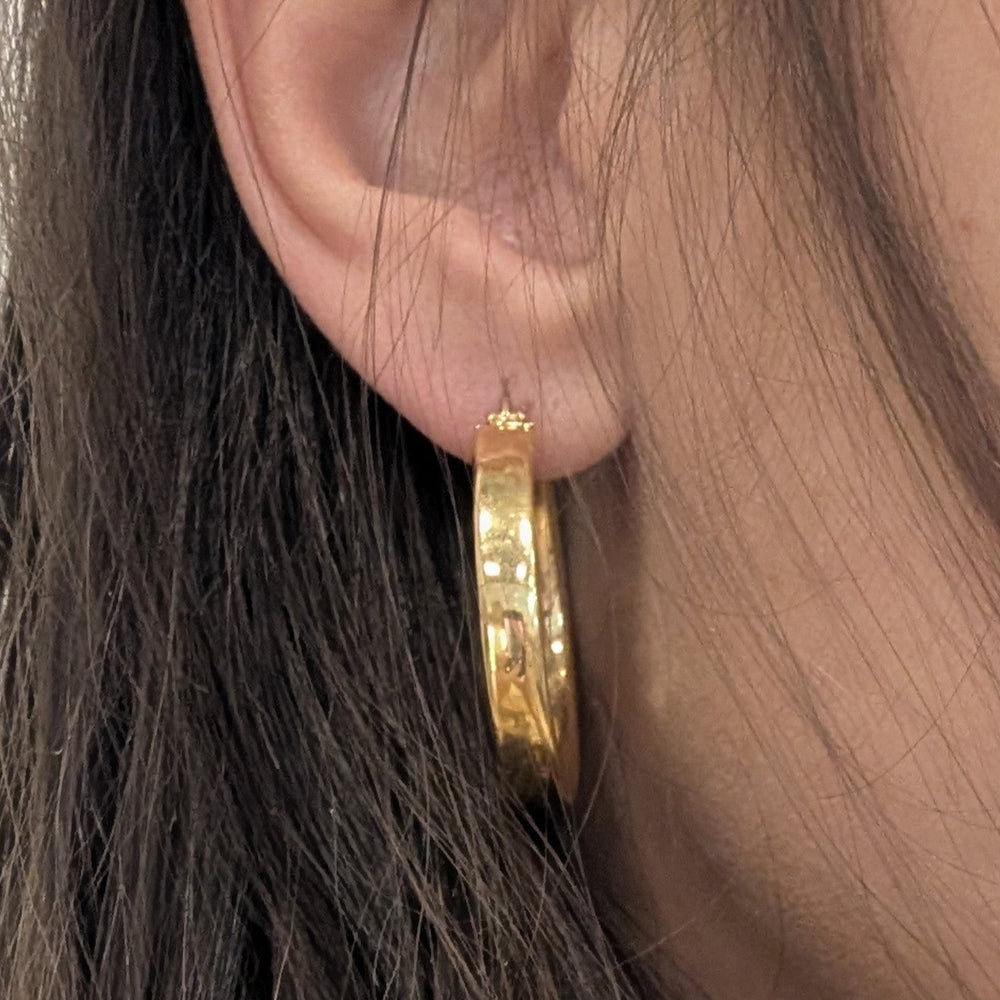 Boucles d'oreilles créoles en or jaune 18K 5.85 Grs