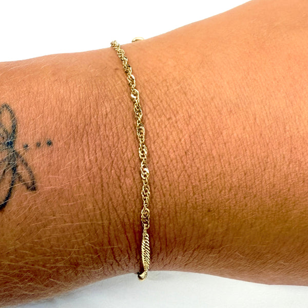 Bracelet torsadé en or jaune 18K - 1.25 Grs