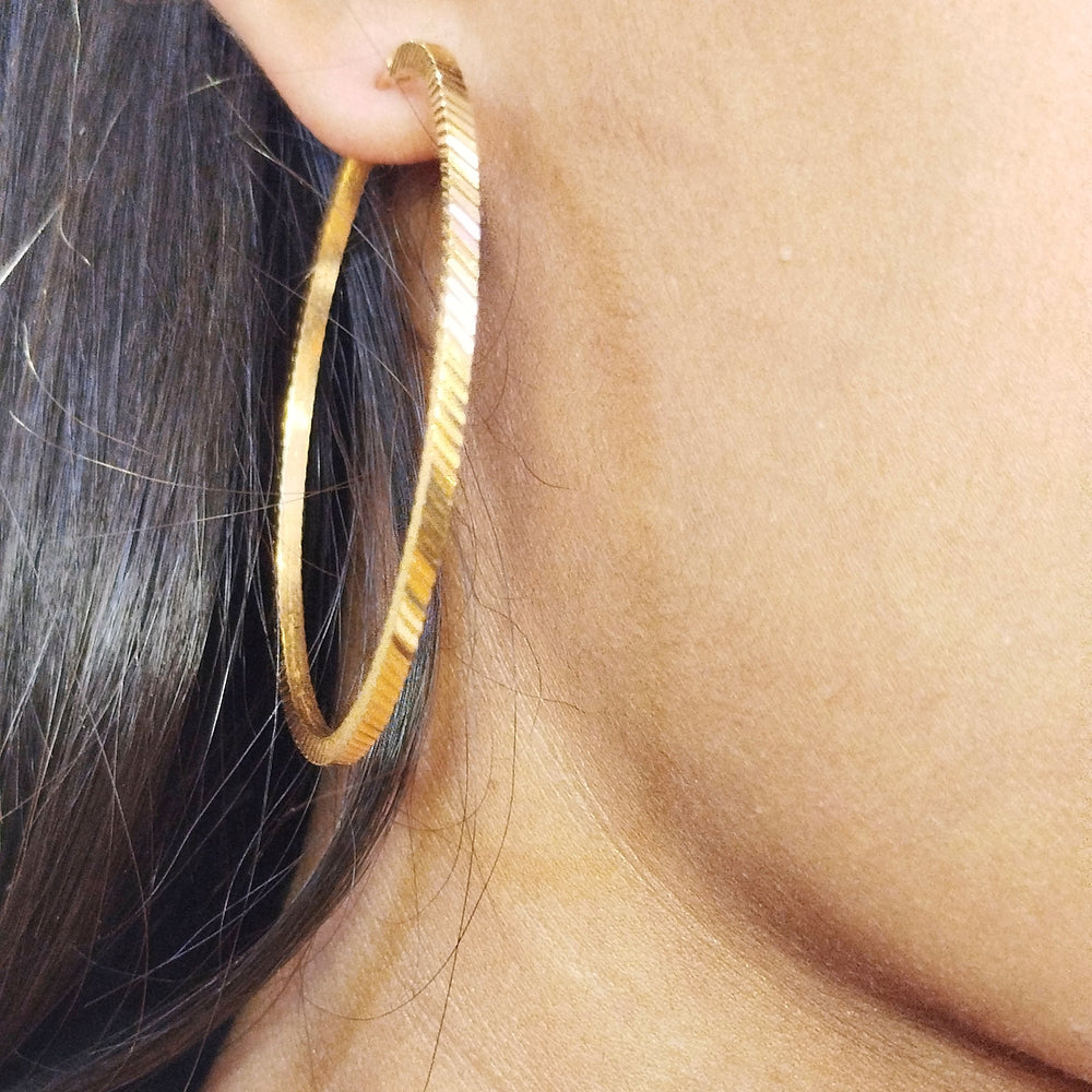 Boucles d'oreilles créoles en or jaune 18K 7.29 Grs