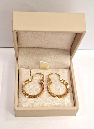 Boucles d'oreilles créoles or jaune 18K