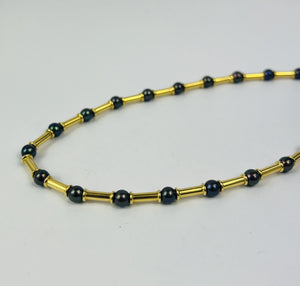 Collier or et perles Hématites