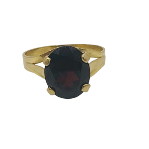 Bague or avec grenat