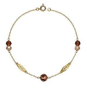 Bracelet station or jaune 18 carats, motifs ajourés