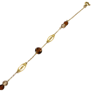 Bracelet station or jaune 18 carats, motifs ajourés