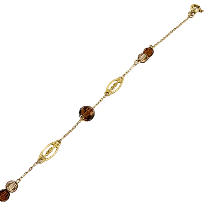 Bracelet station or jaune 18 carats, motifs ajourés