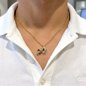 Pendentif en or Jaune et pierres précieuses