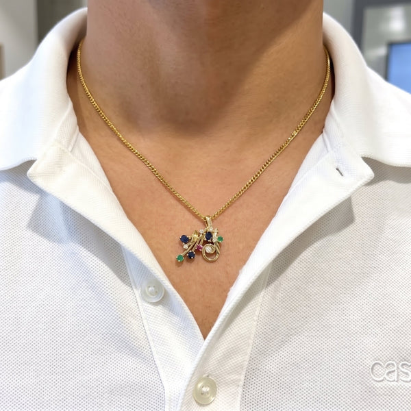 Pendentif en or Jaune et pierres précieuses