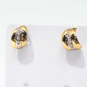Boucles d'oreilles clou en or jaune 18k avec diamants