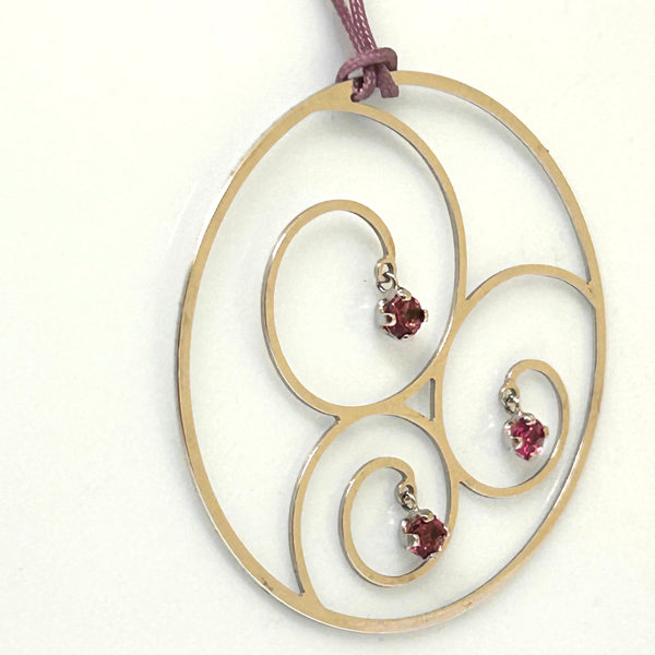 Symbole en or blanc 18 carats avec 3 morganite