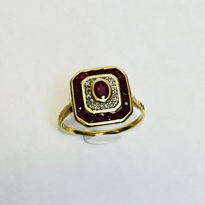 Bague or avec rubis et diamants