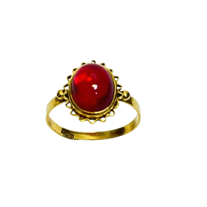 Bague or avec rubis cabochon