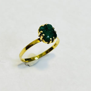 Bague or avec émeraude