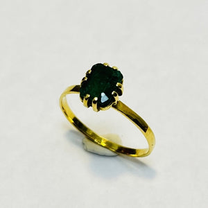 Bague or avec émeraude
