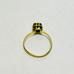 Bague or avec émeraude