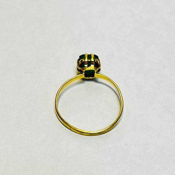 Bague or avec émeraude