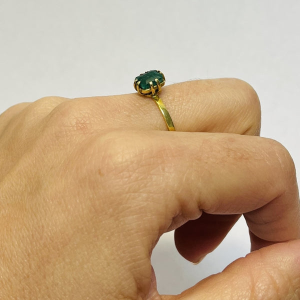 Bague or avec émeraude