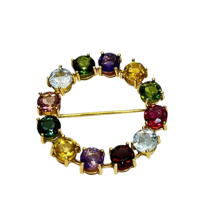 Broche or avec pierres précieuses