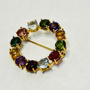 Broche or avec pierres précieuses