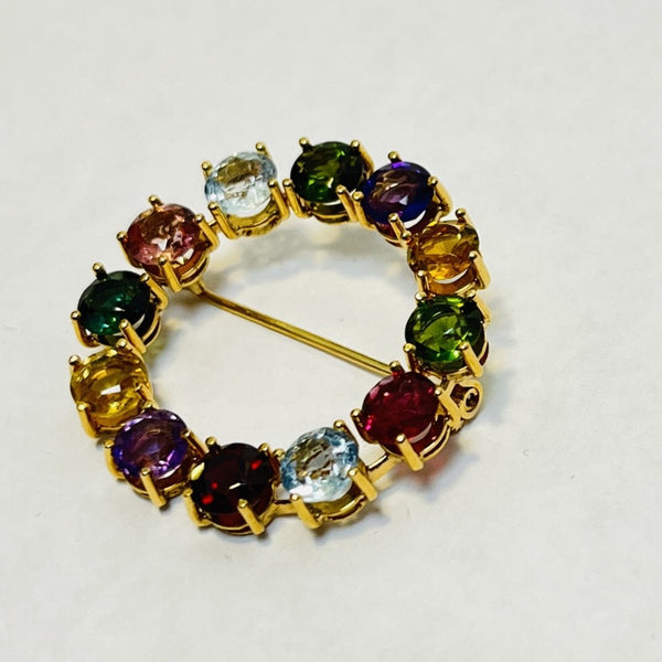 Broche or avec pierres précieuses