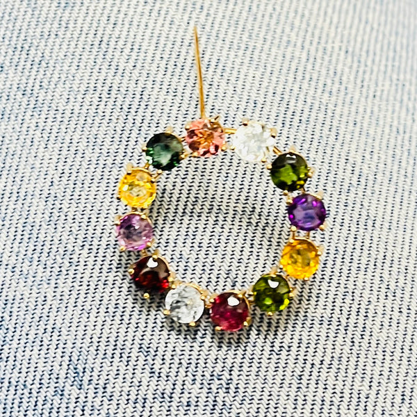 Broche or avec pierres précieuses