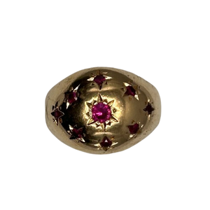 Bague or avec rubis roses
