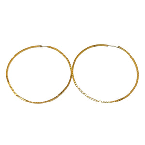 Joli bijou artisanal en or jaune - Boucles demi-créoles