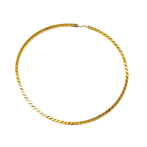 Joli bijou artisanal en or jaune - Boucles demi-créoles