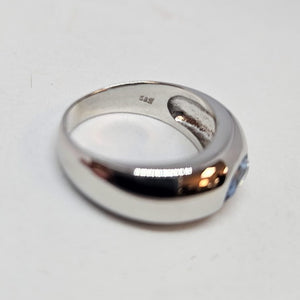 Bague en or blanc 14k avec topaze