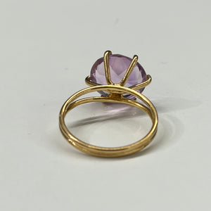 Bague en or jaune 18k et améthyste