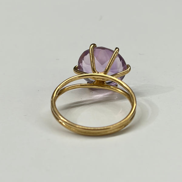 Bague en or jaune 18k et améthyste