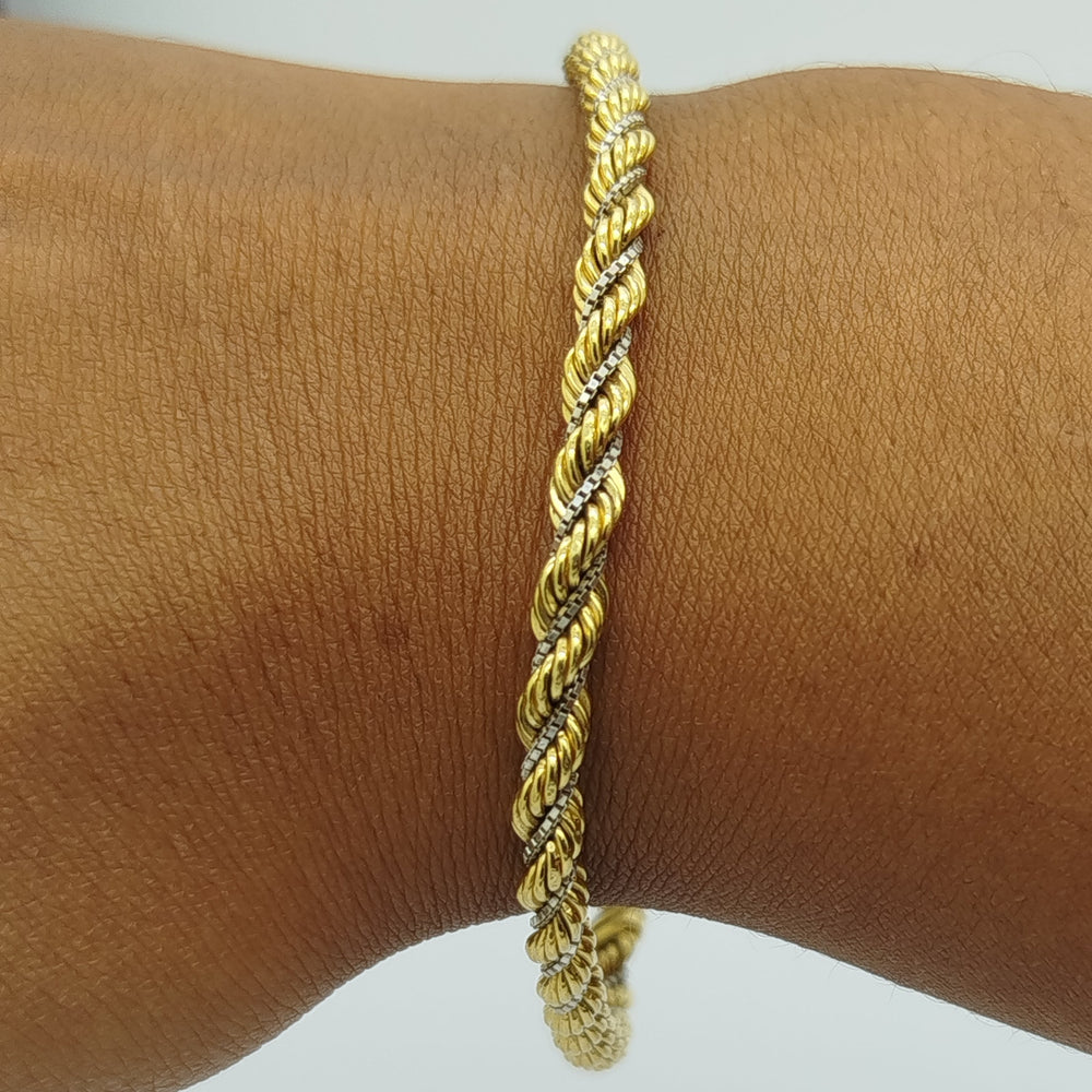 Bracelet maillon torsadé en or jaune et blanc 18 K