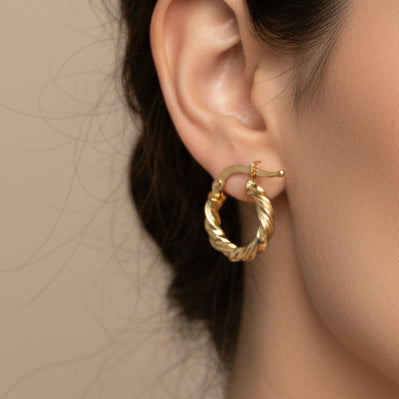 Boucles d'oreilles créoles en or jaune 18K
