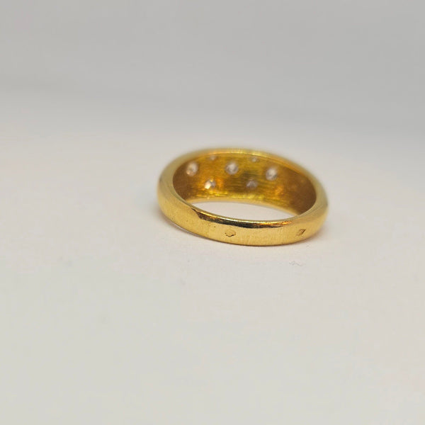 Bagues en or jaune 18k avec 7 diamants 0.07 carats chacun - T 63.5