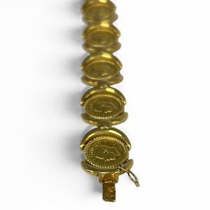 Bracelet médaillon vintage en or jaune