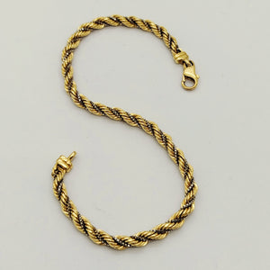 Bracelet maillon torsadé en or jaune et blanc 18 K