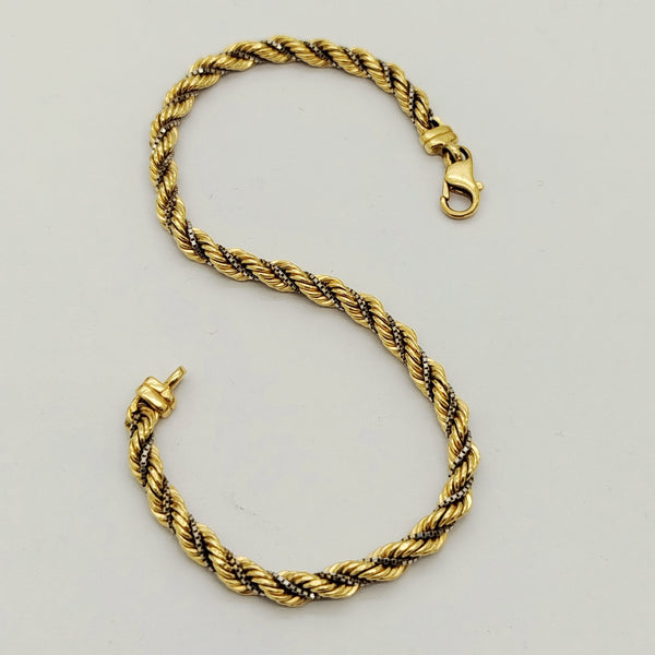 Bracelet maillon torsadé en or jaune et blanc 18 K