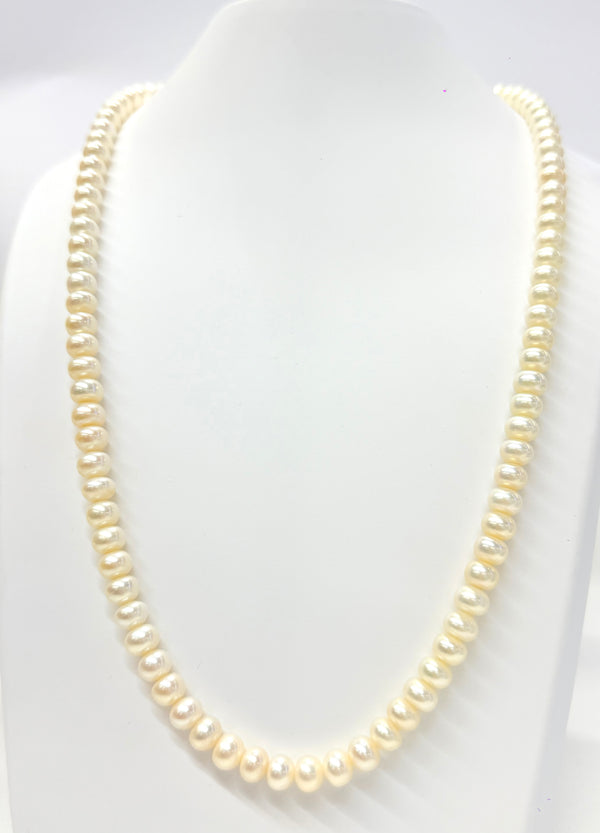 Collier sautoir en or jaune 18 carats et Perles