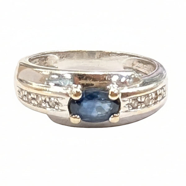 Bague en or blanc 18k avec 1 saphir 8 diamants - T54