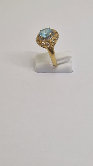 Bague en Or jaune 18K avec Aigue Marine