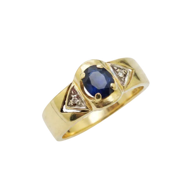 Bague en or jaune avec diamants et saphir