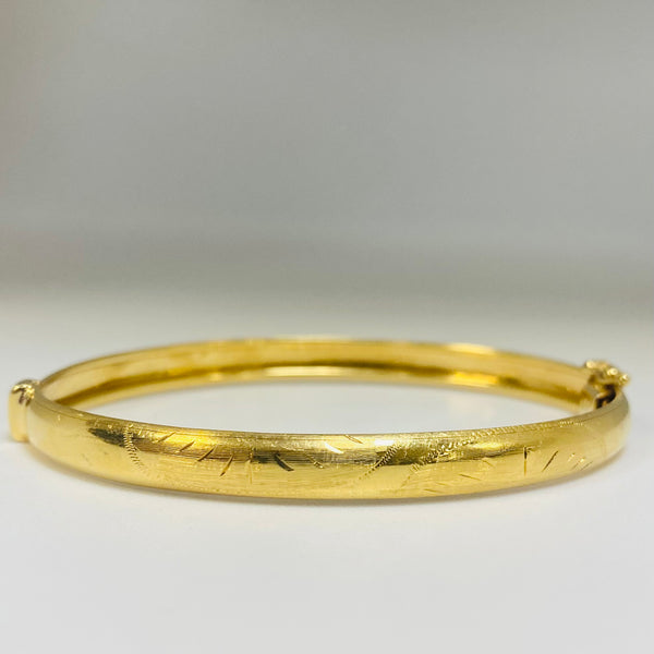 Jonc travaillée en Or jaune 18K Tête d'aigle