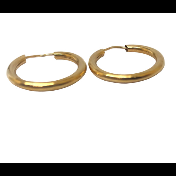 Boucles d'oreilles créoles en or jaune 18K