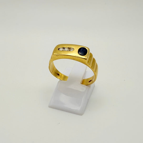 Bague en or jaune 18 K avec diamants et saphir - T 58