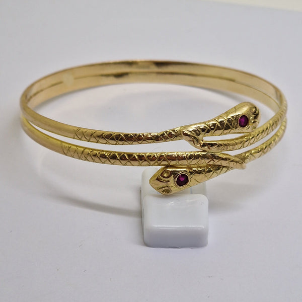 Bracelet Jonc Serpent en Or Jaune 18 Carats avec Rubis 28.31 Grs