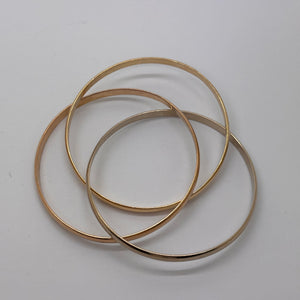 Bracelet jonc en Or Jaune, Or Blanc, Or Rose 18 Carats  ,Poids -37.74 Grs